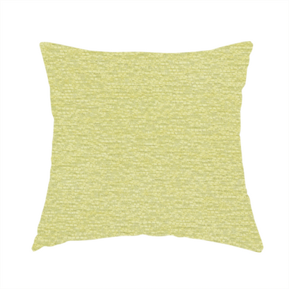 The fabric used to create this handmade cushion is a fresh, vibrant chartreuse-green weave with a sophisticated, textured finish. It is crafted with a dense, nubby construction that creates a subtle horizontal ribbing effect, providing both visual dimension and a soft, inviting tactile quality.