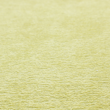 a fresh, vibrant chartreuse-green weave with a sophisticated, textured finish. It is crafted with a dense, nubby construction that creates a subtle horizontal ribbing effect, providing both visual dimension and a soft, inviting tactile quality.
