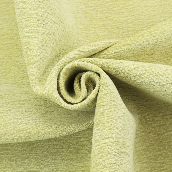 a fresh, vibrant chartreuse-green weave with a sophisticated, textured finish. It is crafted with a dense, nubby construction that creates a subtle horizontal ribbing effect, providing both visual dimension and a soft, inviting tactile quality.