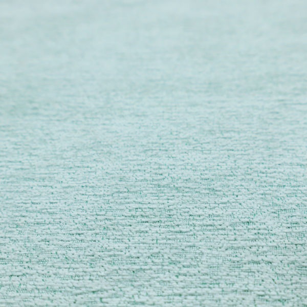 A serene, cool-toned seafoam or soft teal weave with a sophisticated, textured finish.