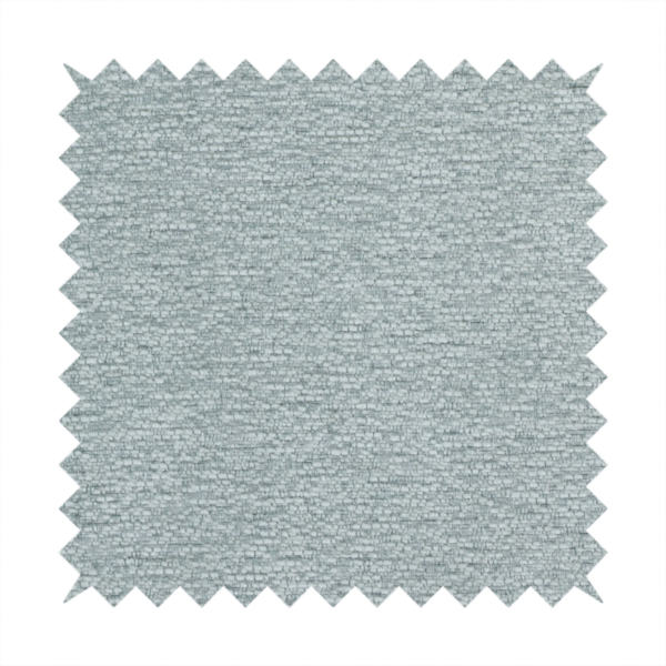 A sophisticated, cool-toned sage green weave with a refined, textured finish. It is crafted with a dense, nubby construction that creates a subtle horizontal ribbing effect, providing both visual dimension and a soft, inviting tactile quality.