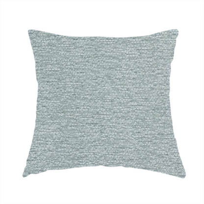 The fabric used to create this handmade cushion is a sophisticated, cool-toned sage green weave with a refined, textured finish. It is crafted with a dense, nubby construction that creates a subtle horizontal ribbing effect, providing both visual dimension and a soft, inviting tactile quality.