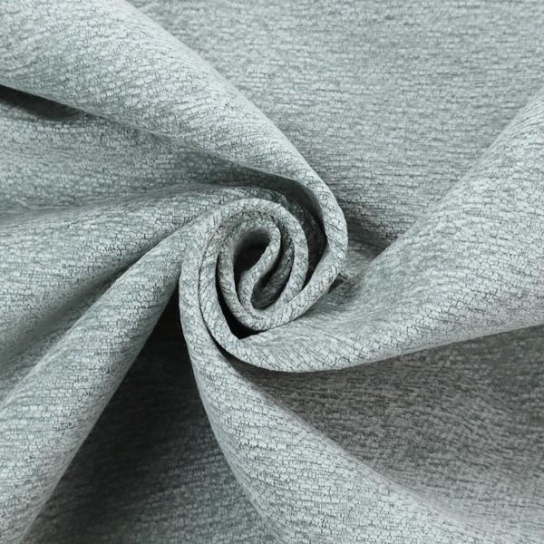 A sophisticated, cool-toned sage green weave with a refined, textured finish. It is crafted with a dense, nubby construction that creates a subtle horizontal ribbing effect, providing both visual dimension and a soft, inviting tactile quality.