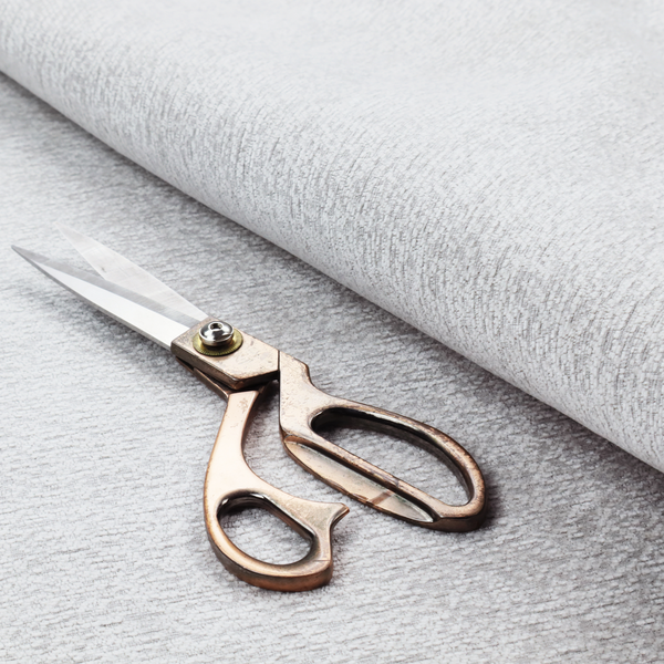 A clean, contemporary light-grey and white weave. It is crafted with a dense, nubby construction that creates a subtle horizontal ribbing effect, providing both visual dimension and a soft, tactile quality.