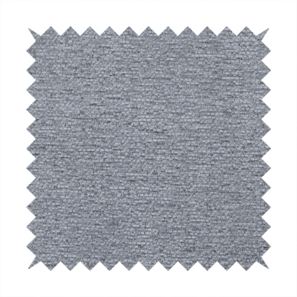 A sophisticated, deep charcoal and slate-grey weave. It features a dense, nubby construction that creates an intricate horizontal ribbing effect, providing significant visual depth and a substantial, inviting tactile quality.
