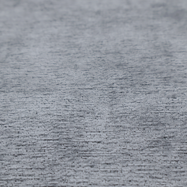 A sophisticated, deep charcoal and slate-grey weave. It features a dense, nubby construction that creates an intricate horizontal ribbing effect, providing significant visual depth and a substantial, inviting tactile quality.