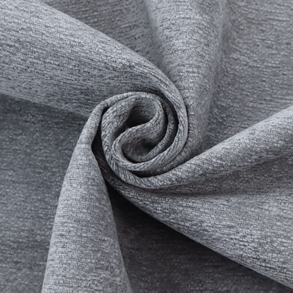A sophisticated, deep charcoal and slate-grey weave. It features a dense, nubby construction that creates an intricate horizontal ribbing effect, providing significant visual depth and a substantial, inviting tactile quality.