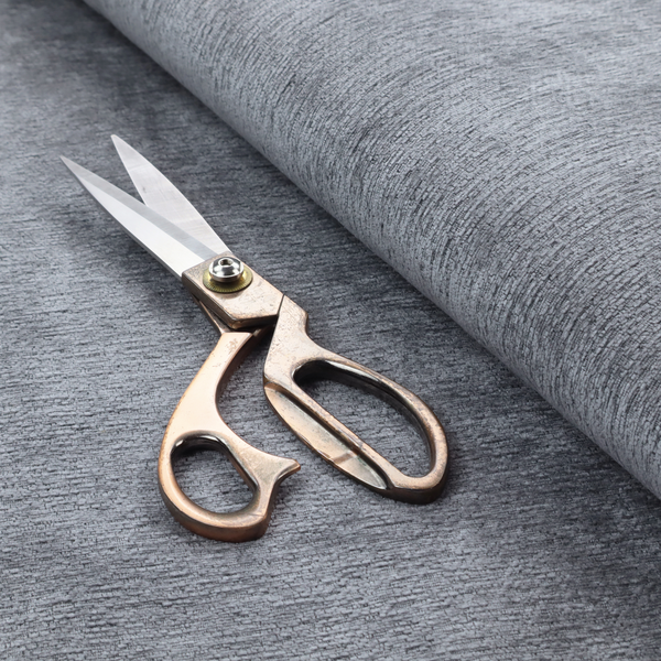 A sophisticated, deep charcoal and slate-grey weave. It features a dense, nubby construction that creates an intricate horizontal ribbing effect, providing significant visual depth and a substantial, inviting tactile quality.