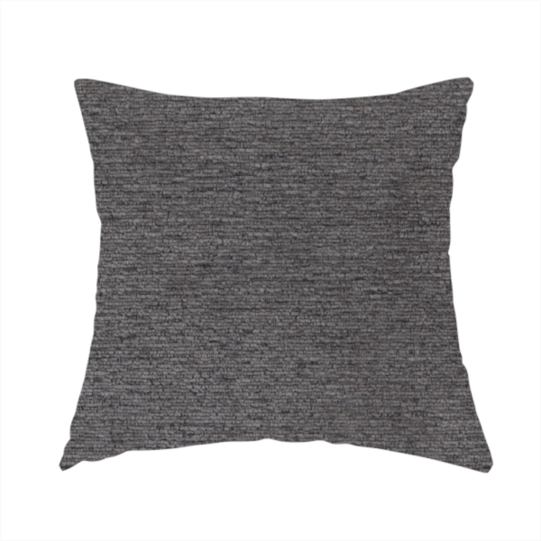 The fabric used to create this handmade cushion is a deep, sophisticated charcoal-grey weave. It is constructed with a dense, nubby texture that creates a subtle, consistent horizontal ribbing effect, providing significant visual depth and a substantial, premium feel.