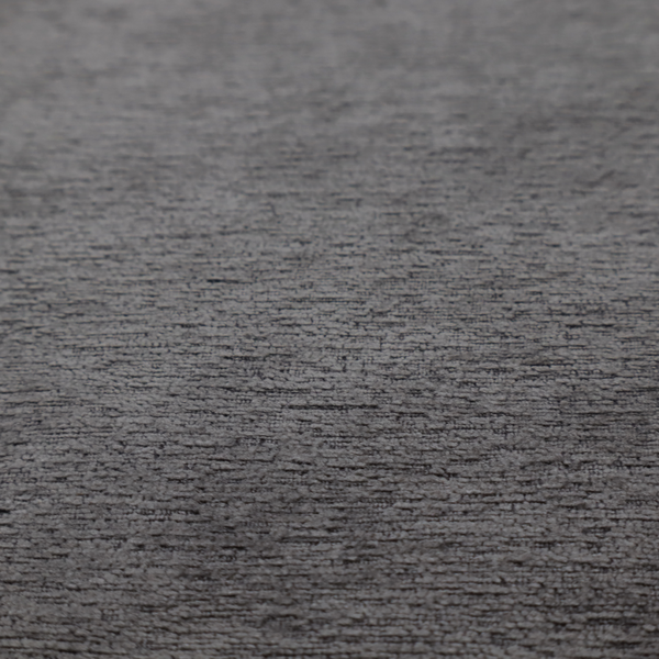 A deep, sophisticated charcoal-grey weave. It is constructed with a dense, nubby texture that creates a subtle, consistent horizontal ribbing effect, providing significant visual depth and a substantial, premium feel.