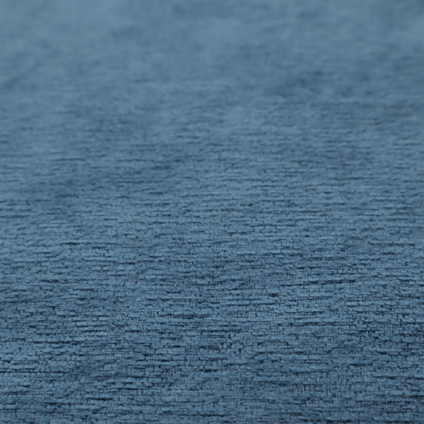 A rich, deep navy-blue weave with a sophisticated, textured finish. It is crafted with a dense, nubby construction that creates a subtle horizontal ribbing effect, providing both visual dimension and a substantial, premium feel.