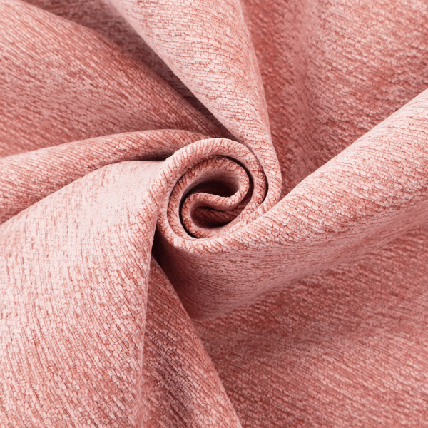 A soft, pastel coral-pink fabric with a dense, nubby textured weave and subtle horizontal ribbing, adding a gentle and welcoming pop of colour to decorative cushions or accent pieces.