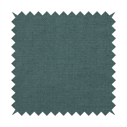 A textured woven fabric in a solid, deep sage green or muted forest green colour.