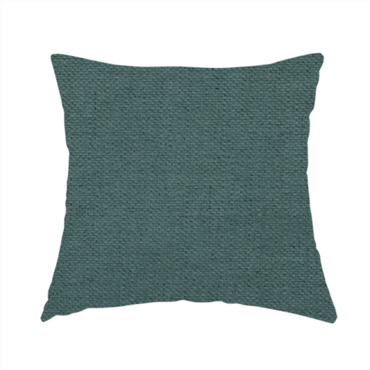 The fabric used to create this handmade cushion is a textured woven fabric in a solid, deep sage green or muted forest green colour.