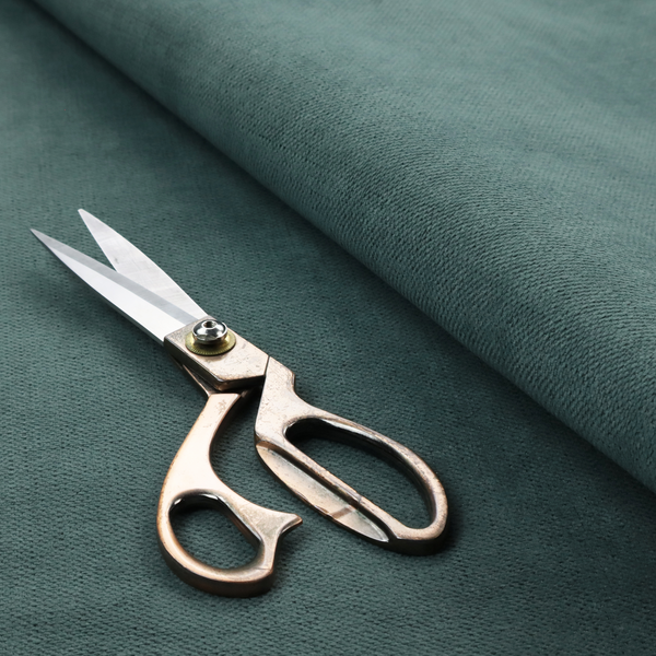 A textured woven fabric in a solid, deep sage green or muted forest green colour.