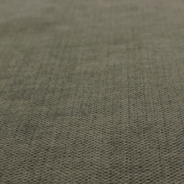 A textured woven fabric in a deep olive green or charcoal-olive hue.