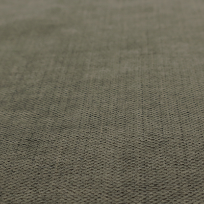 A textured woven fabric in a deep olive green or charcoal-olive hue.