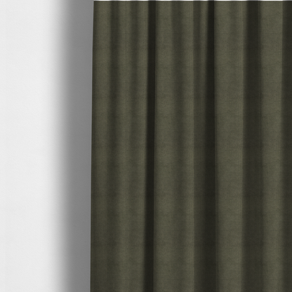 The fabric used to create these made-to-measure curtains is a textured woven fabric in a deep olive green or charcoal-olive hue.