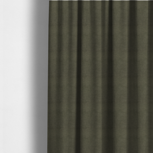The fabric used to create these made-to-measure curtains is a textured woven fabric in a deep olive green or charcoal-olive hue.