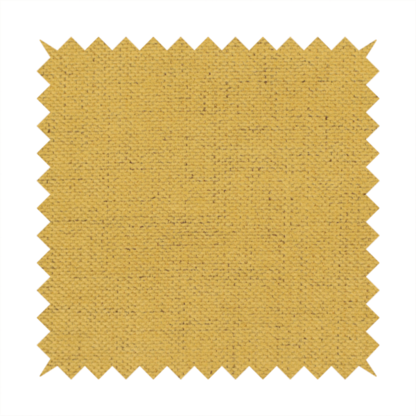 A textured woven fabric in a warm mustard yellow or golden ochre shade.