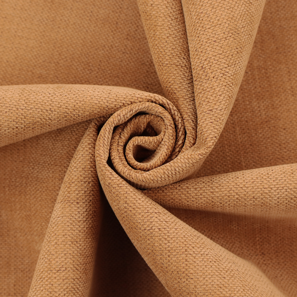 A textured woven fabric in a warm terracotta or soft pumpkin orange shade.