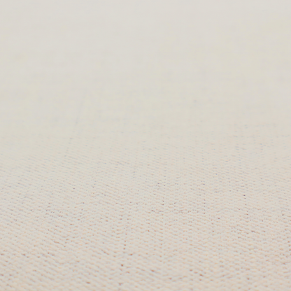 A textured woven fabric in a warm off-white, light cream, or pale beige shade.