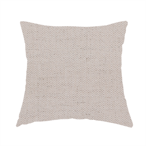 The fabric used to create these handmade cushions is a textured woven fabric in a very pale, dusty blush pink or soft ivory shade with a subtle rosy undertone.