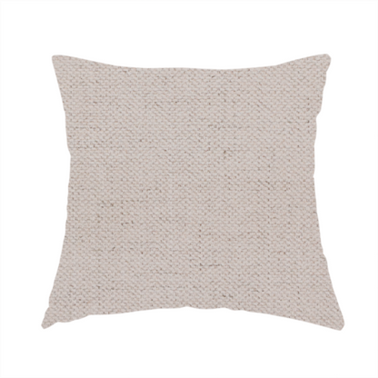 The fabric used to create these handmade cushions is a textured woven fabric in a very pale, dusty blush pink or soft ivory shade with a subtle rosy undertone.