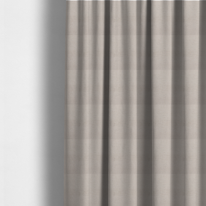 The fabric used to create these made-to-measure curtains is a textured woven fabric in a very pale, dusty blush pink or soft ivory shade with a subtle rosy undertone.
