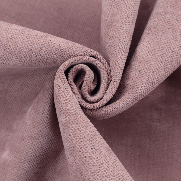 A textured woven fabric in a dusty, muted rose or pale mauve shade.