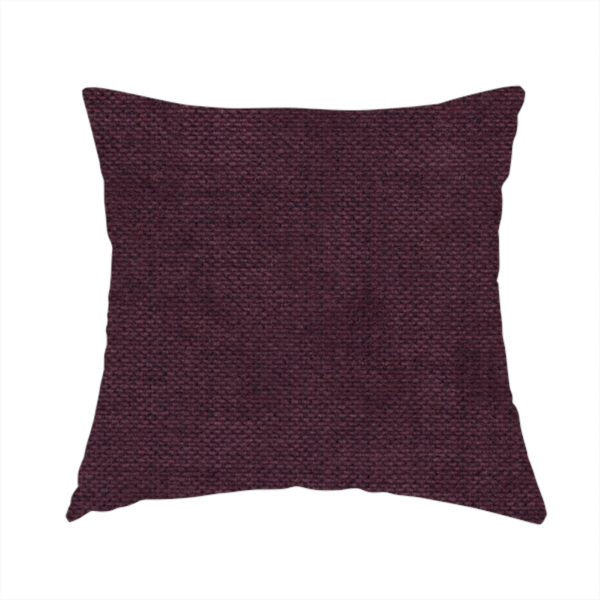 The fabric used to create these handmade cushions is a textured woven fabric in a deep burgundy, plum, or dark aubergine shade.