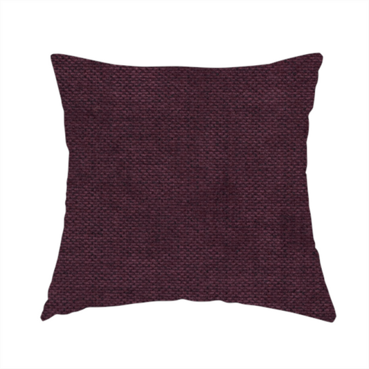The fabric used to create these handmade cushions is a textured woven fabric in a deep burgundy, plum, or dark aubergine shade.