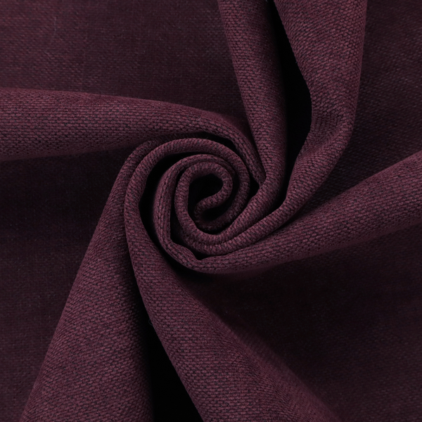 A textured woven fabric in a deep burgundy, plum, or dark aubergine shade.