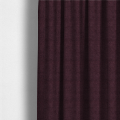 The fabric used to create these made-to-measure curtains is a textured woven fabric in a deep burgundy, plum, or dark aubergine shade.