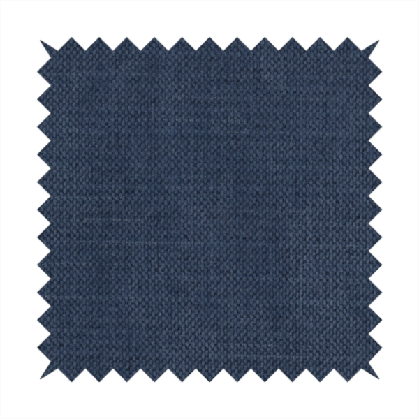 A textured woven fabric in a deep denim or classic navy blue shade.