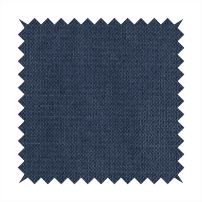 A textured woven fabric in a deep denim or classic navy blue shade.