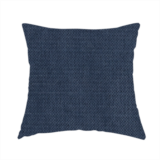 The fabric used to create this handmade cushion is a textured woven fabric in a deep denim or classic navy blue shade.