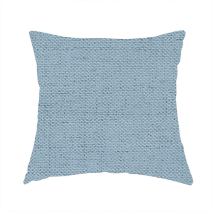 The fabric used to create these handmade cushions is a textured woven fabric in a soft, light powder blue or serene sky blue shade.