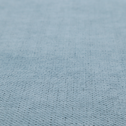 A textured woven fabric in a soft, light powder blue or serene sky blue shade.