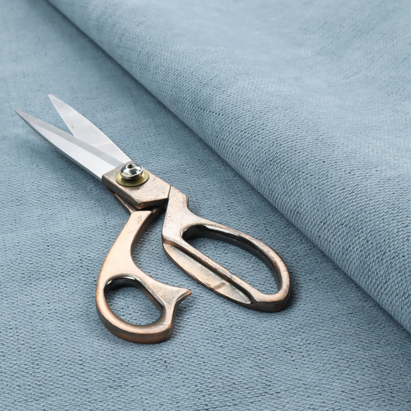 A textured woven fabric in a soft, light powder blue or serene sky blue shade.