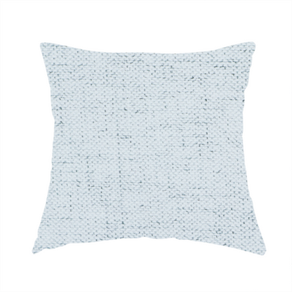 The fabric used to create this handmade cushion is a textured woven fabric in a very pale, icy blue or light mist grey-blue shade.