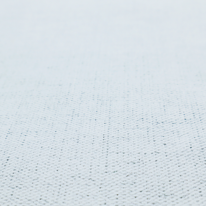 A textured woven fabric in a very pale, icy blue or light mist grey-blue shade.