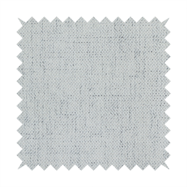 A textured woven fabric in a cool, light grey or soft slate shade.