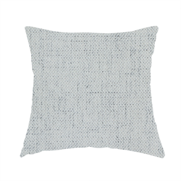The fabric used to create this handmade cushion is a textured woven fabric in a cool, light grey or soft slate shade.