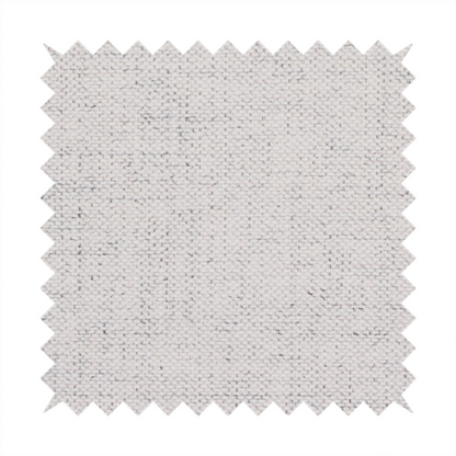 a textured woven fabric in a very light grey or soft ash shade.