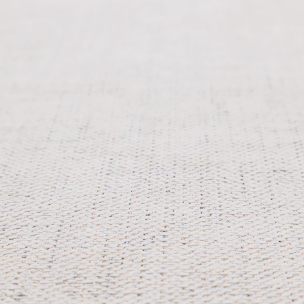 a textured woven fabric in a very light grey or soft ash shade.