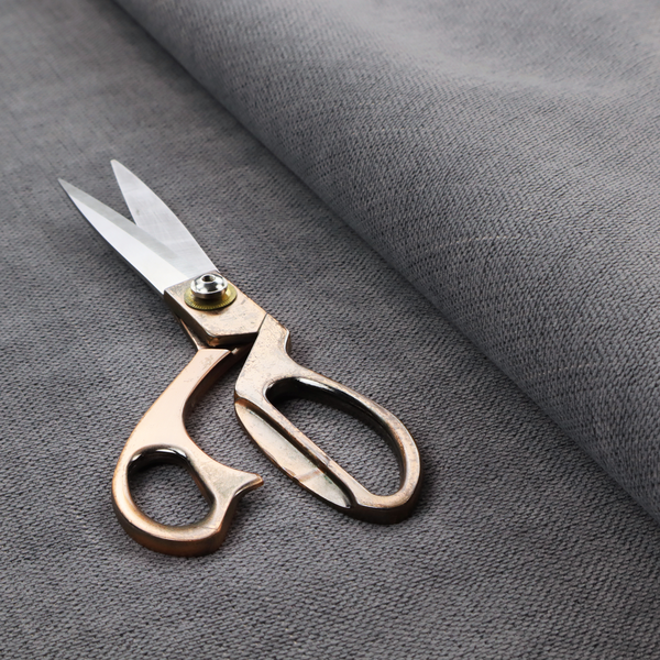 a textured woven fabric in a medium charcoal or slate grey shade.