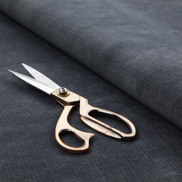 a textured woven fabric in a deep slate or dark charcoal grey shade.