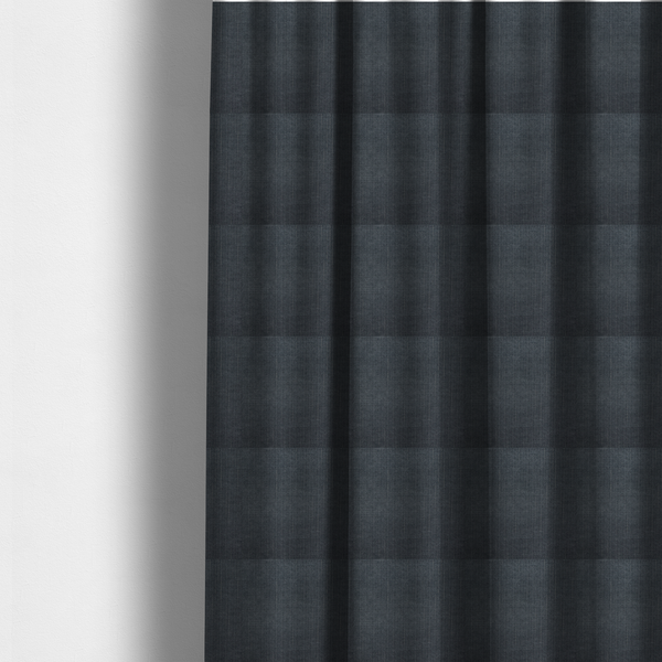 The fabric used to create these made-to-measure curtains is a textured woven fabric in a deep slate or dark charcoal grey shade.