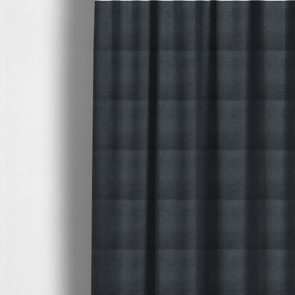 The fabric used to create these made-to-measure curtains is a textured woven fabric in a deep slate or dark charcoal grey shade.